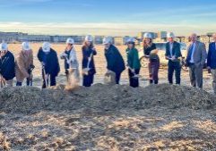 Future students (far left) join community leaders and DCSD Superintendent Erin Kane with shovels in hand for the official groundbreaking of Elementary School 50 in Lone Tree.