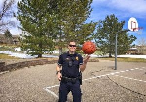 Sean showing off some ball skills as a School Resource Officer for DCSO. 