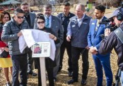 John and Maria Castillo (front left), along with Douglas County community leaders, unveil plans for the Kendrick Castillo Memorial Fund and a monument in his honor at Civic Green Park in Highlands Ranch.