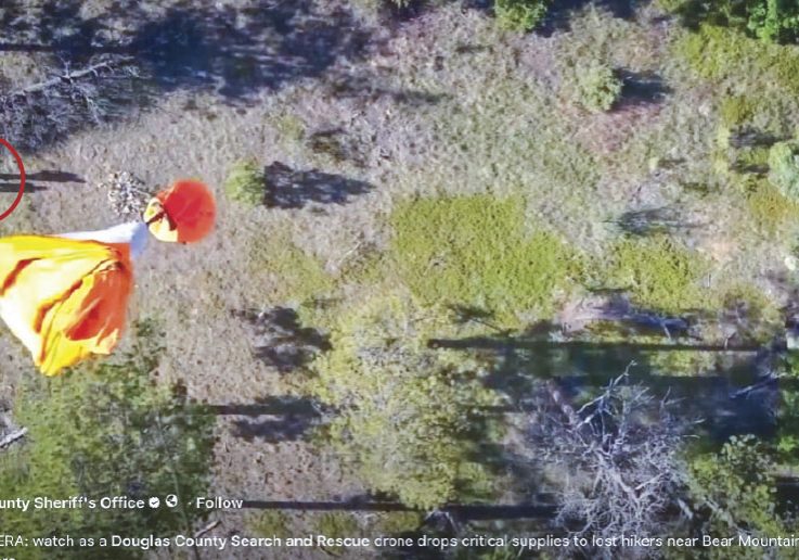 Aerial video footage of a drone dropping a care package of supplies to lost hikers near Bear Mountain.