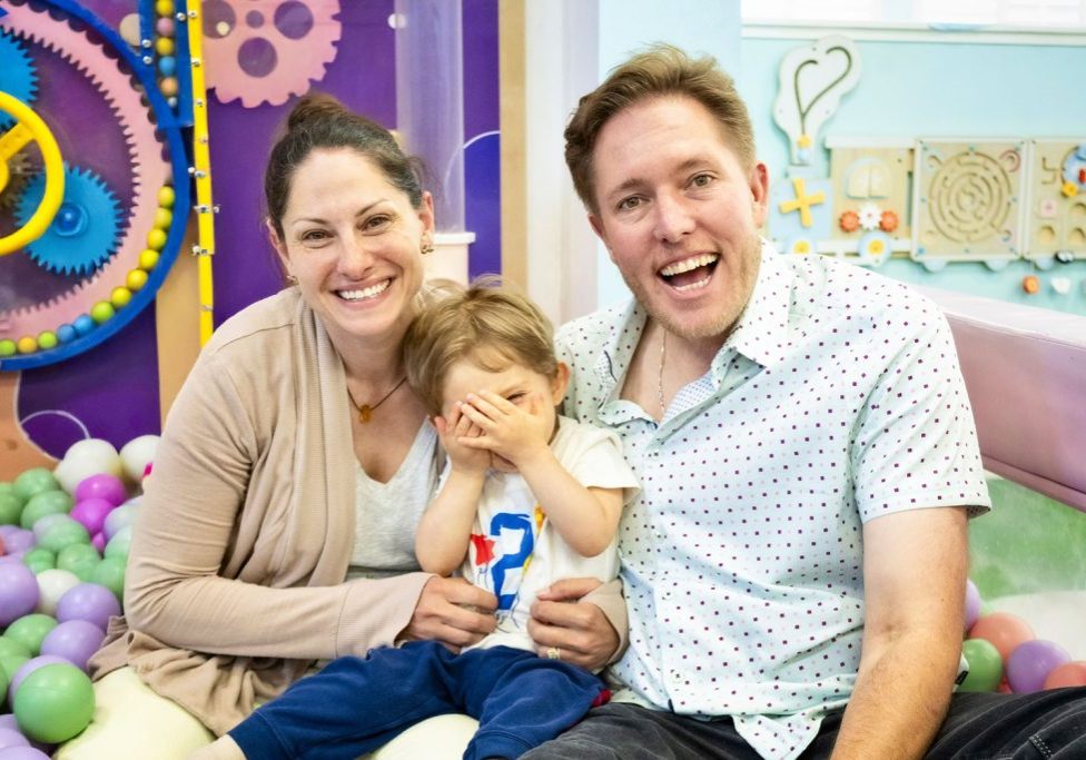 Robert Tait enjoys family time at a kids play place with his wife, Jacqueline, and their son, Declan.

