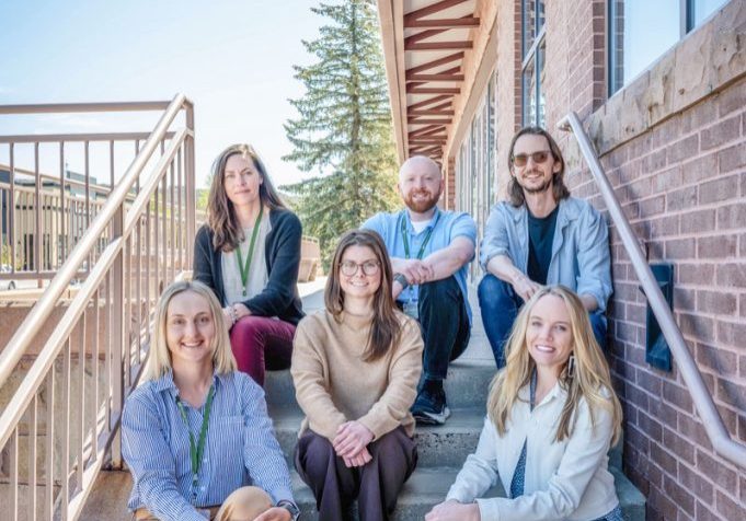Members of the Douglas County Department of Communication and Community Engagement. Inset: June 2026 cover of The Douglas County Neighbor.