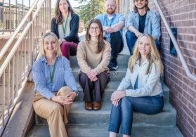 Members of the Douglas County Department of Communication and Community Engagement. Inset: June 2026 cover of The Douglas County Neighbor.