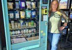 Amanda Ball, owner of Colorado Creative Vending, with her repurposed snack vending machines, now curated with fun artistic items.