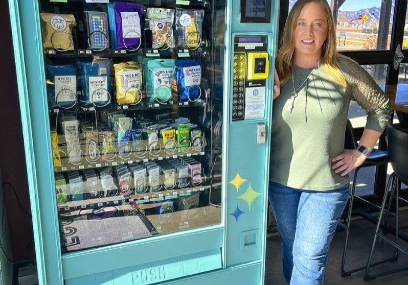 Amanda Ball, owner of Colorado Creative Vending, with her repurposed snack vending machines, now curated with fun artistic items.