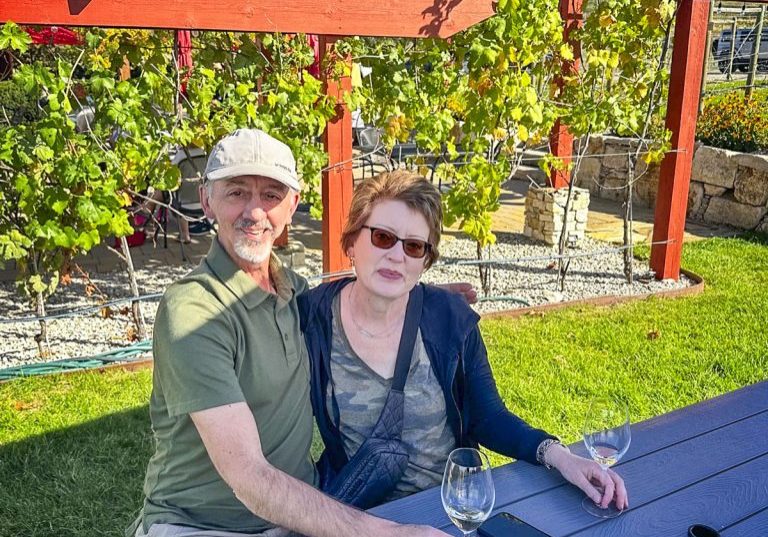 Stephanie Thaggard Tanner and her husband Rob at a vineyard and winery in Kelowna, British Columbia, in September 2024.