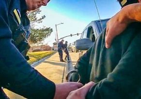 Douglas County Sheriff’s Office deputies taking two shoplifters into custody.