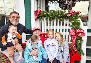 Matt and Kim Gower (Poppa and Gigi) at St. Nick’s Christmas and Collectibles in 2025, with their four beloved grandchildren (from left to right): Tyr, Freyja, Kennedy and KayLee. They take the grandchildren every year to pick out ornaments.
