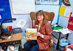Jodi Stevens reading the book she authored with her daughter, Abby, at Pioneer Elementary School in Parker in January. 