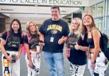 From left to right: Hannah Zang, Grace Williams, Principal Andy Abner, Lauren Wilky and Lauren Scott wanted to connect with the community by partnering with a nonprofit.