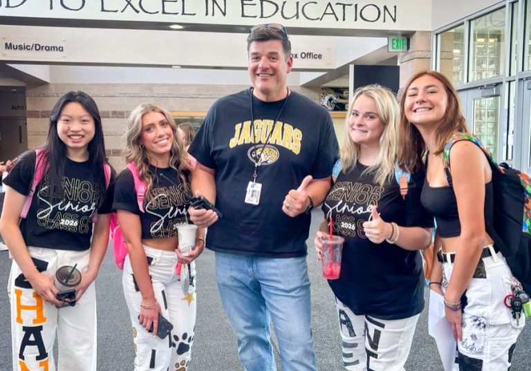 From left to right: Hannah Zang, Grace Williams, Principal Andy Abner, Lauren Wilky and Lauren Scott wanted to connect with the community by partnering with a nonprofit.