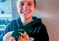 Guinea pigs are social and affectionate. Gabe is relaxed and purring as Grant Neira holds him.