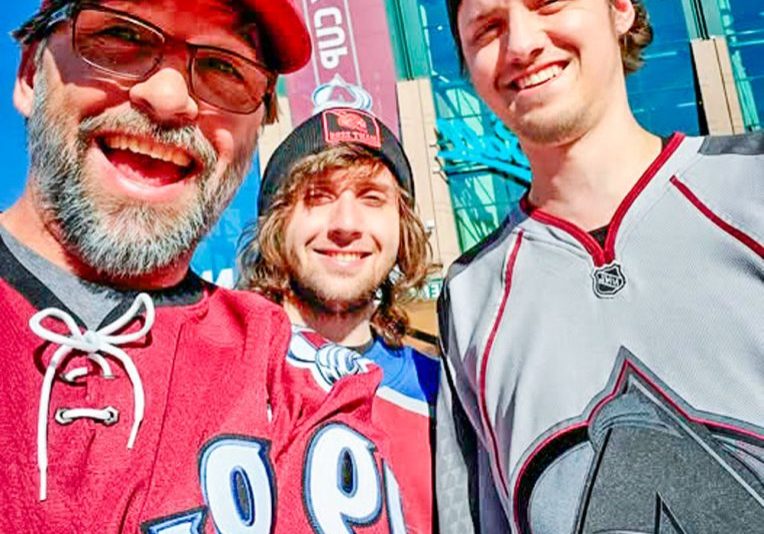 Eric Coronis and his sons, Holden (middle) and Devan (right), at a Colorado Avalanche game.