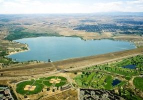 View looking south across Cherry Creek Dam and Lake, which was constructed by the U.S. Army Corps of Engineers and completed in 1950. Photo courtesy of Denver Public Library.
