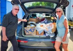 Jim Kelly and Mary Murray collected two carloads of donations to deliver to Help & Hope Center.