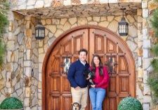 First family pic of the Roths: Mitchell and Chiersten with dogs Benny and Newman in front of their new home in the Village. 